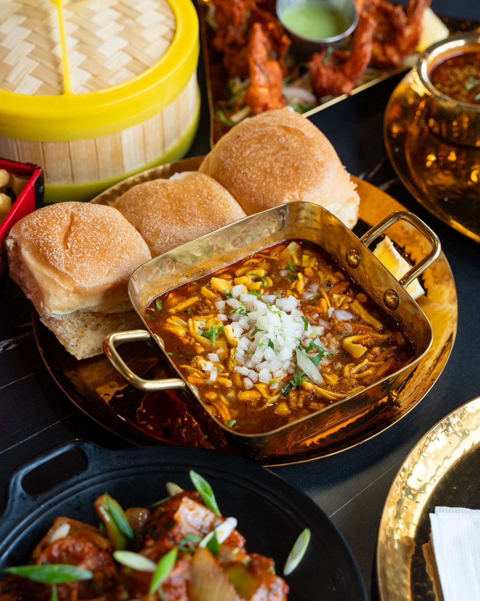 Chef Amyth preparing authentic Vada Pav and Mumbai street food at Vivaan's Yummies Calgary